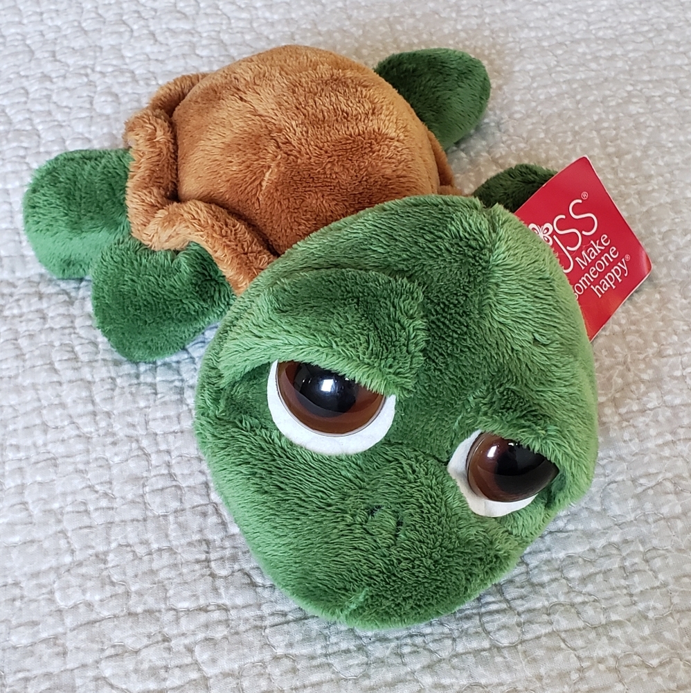Big Eyed Turtle by Russ, green and rusty brown. 9 inches head to tail